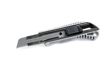 Придбати Ніж висувний 18мм металевий, обгумований корпус, автозамок СИЛА Нож выдвижной 18мм металлический, обрезиненный корпус, автозамок СИЛА